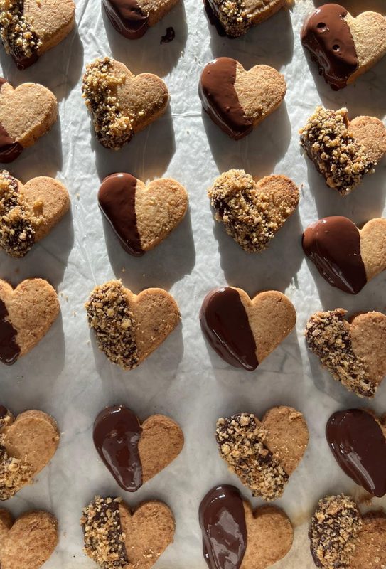Heart-shaped shortbread dipped in chocolate